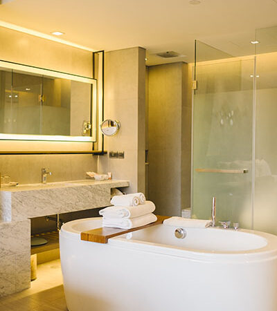 luxury bathtub inside bedroom in hotel